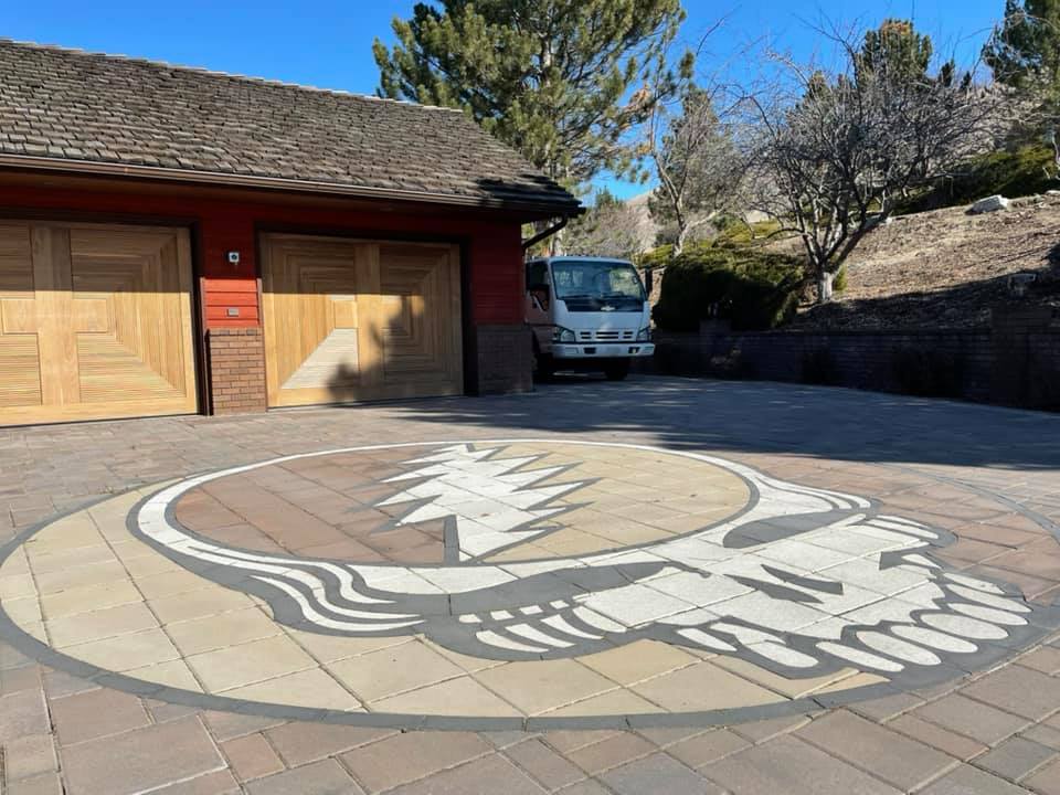 Custom stone driveway with skull design in the middle